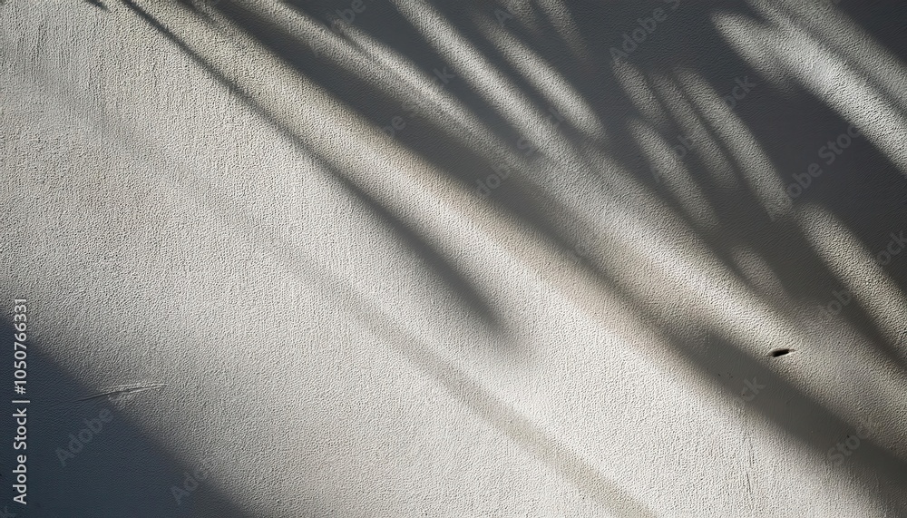 Poster textured plaster wall with soft diagonal light shadow. minimalist stucco surface background for inte