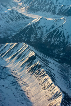 Flying for alaska winter apline valleys from the air