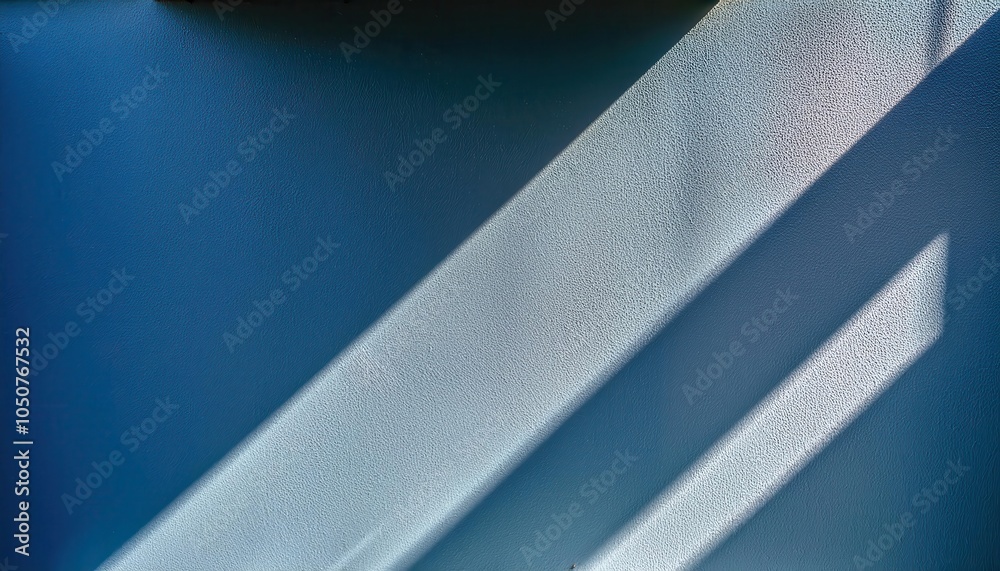 Aufkleber abstract textured blue wall with diagonal shadows from sunlight through window, minimalist backgroun