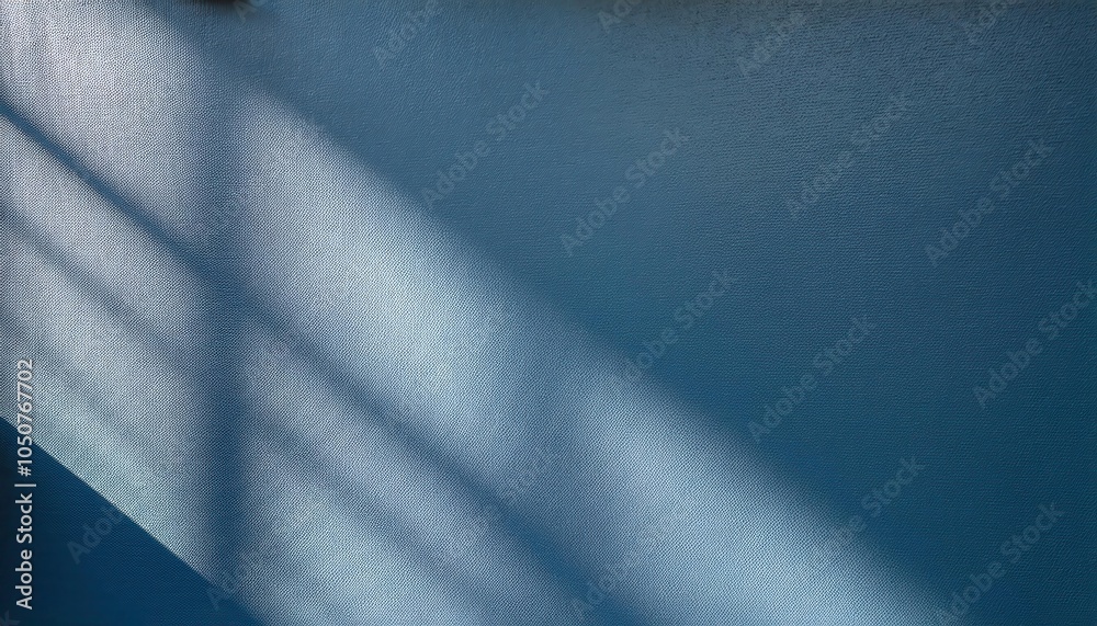 Poster abstract textured blue wall with diagonal shadows from sunlight through window, minimalist backgroun