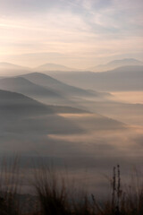 Obraz premium misty layers in mountains of Kastoria Greece
