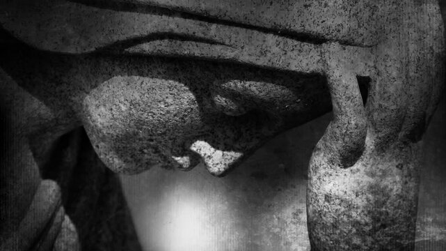 Cemetery statue non looping grunge background in black and white