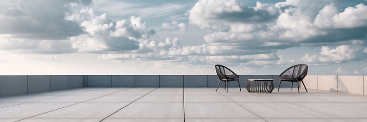 Two black chairs and a table on a rooftop with a cloudy sky - Modern minimalist design for peaceful relaxation   