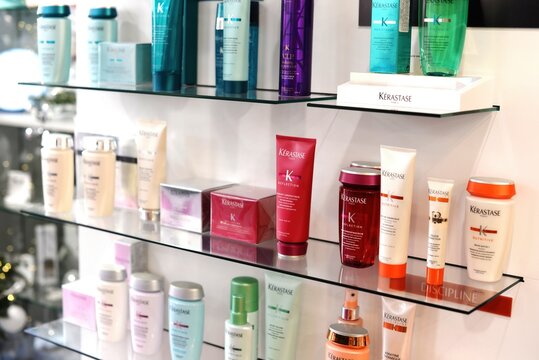 Shelfs with Professional loreal Kerastase haircare products. French luxury cosmetics for hair