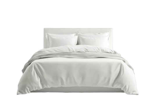 Modern white bedding set with decorative pillows arranged on a neatly made bed showcasing minimalist design aesthetic
