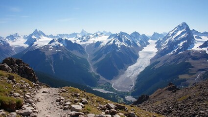 High altitude trail with snow summits and glaciers