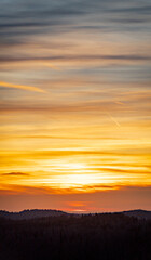 Yellow sunset in the French Jura mountains
