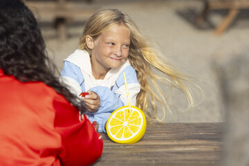 Young girl with Stuve-Wiedemann syndrome enjoying a sunny day outdoors