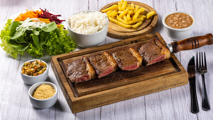 rump steak with fries and rice