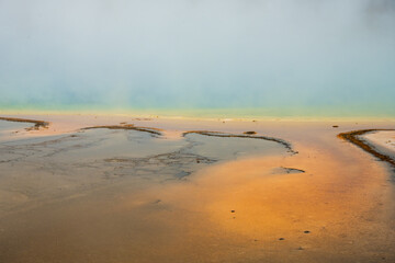 Brown And Orange Colors At The Edge Of Grand Prismatic Fade Into The Morning Fog