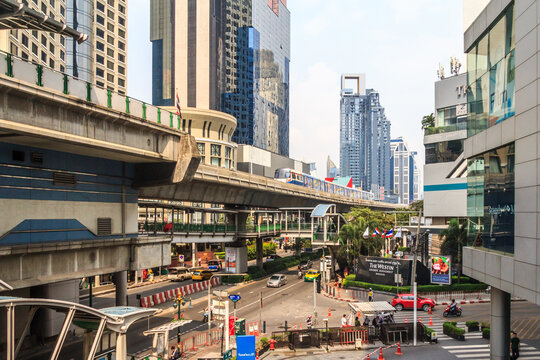 Skytrain heading down Sukhumvit Road towards Asoe Station, Bangkok, Thailand