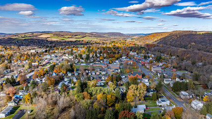 Aerial photo of fall foliage surrounding the Village of Homer, Cortland County, New York State,...