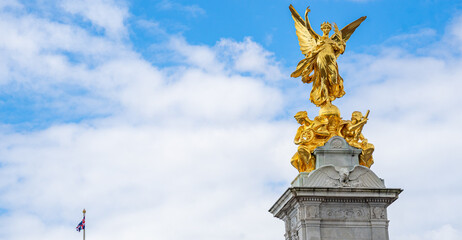next to Buckingham Palace and the Victoria memorial with the angel of justice in London.
