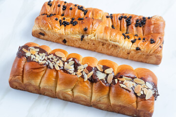 Pastry with chocolate butter and banana filling. perfect for recipe, article, catalogue, or any commercial purposes. with copy space.