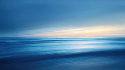 Obraz premium A serene landscape of the deep blue sea at twilight,