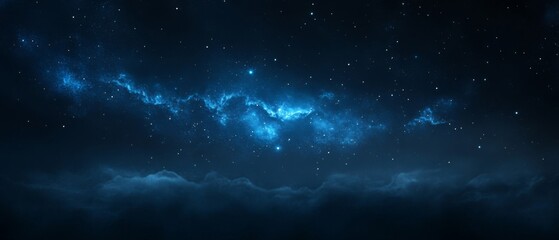 Obraz premium Starry Night with a Nebula Over a Bank of Clouds