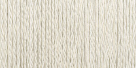 Obraz premium A Detailed Texture of Intertwined Creamy White Threads, Creating a Consistent Pattern of Vertical and Diagonal Lines