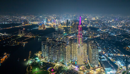 Naklejka premium Landmark 81 Vinhomes Central Park, Ho Chi Minh City, Vietnam. Night beautiful wallpaper Beautiful panoramic city