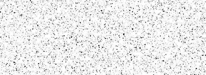 Dirty dotted seamless pattern. Black and white grunge sprinkles, particles, dust and splashes wallpaper. Distress noise grain repeating background. Random mottled gritty overlay texture. Vector