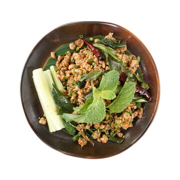 Pan-fried northern thai style minced pork with mixed herb. A dish called larb or laab - a salad made of ground meat mixed with a unique blend of spices.