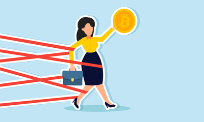 Obraz premium A businesswoman holding a bitcoin is tangled and trapped in ropes, illustration of mistakes in implementing bitcoin investment strategies