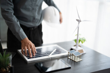 Engineer planning for Solar panels green energy Business man working Innovation  green eco friendly in modern office business  Planing Bio economy for business renewable energy eco friendly