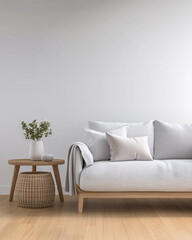 A cozy living room corner with a light-colored sofa and a natural fiber table
