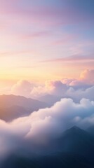 Fototapeta premium Stunning view of mountains and clouds during sunset, showcasing vibrant colors and serene atmosphere.