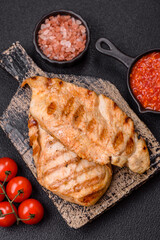 Delicious fresh grilled chicken fillet with spices and herbs