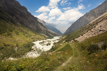 Scenic river trail and pristine nature in the mountain valley of Ala Archa national park