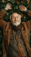 Naklejka premium A man lies on the ground, arms outstretched, looking up with a smile. AI.