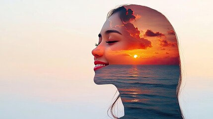 Silhouette of a woman with sunset reflection in serene ocean background.