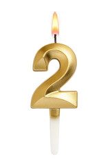 Golden decorated burning birthday candle digit two shaped isolated. Transparent PNG image.
