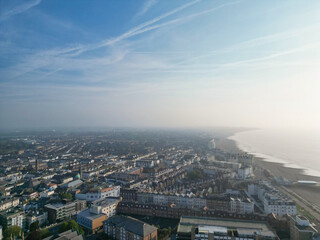 Fototapeta premium High Angle View of Historical Central Eastbourne Buildings and City of England, United Kingdom. Aerial Footage Was Captured with Drone's Camera During Windy Day on May 11th, 2024