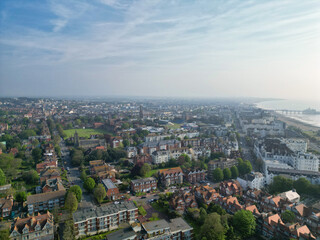 Obraz premium High Angle View of Historical Central Eastbourne Buildings and City of England, United Kingdom. Aerial Footage Was Captured with Drone's Camera During Windy Day on May 11th, 2024