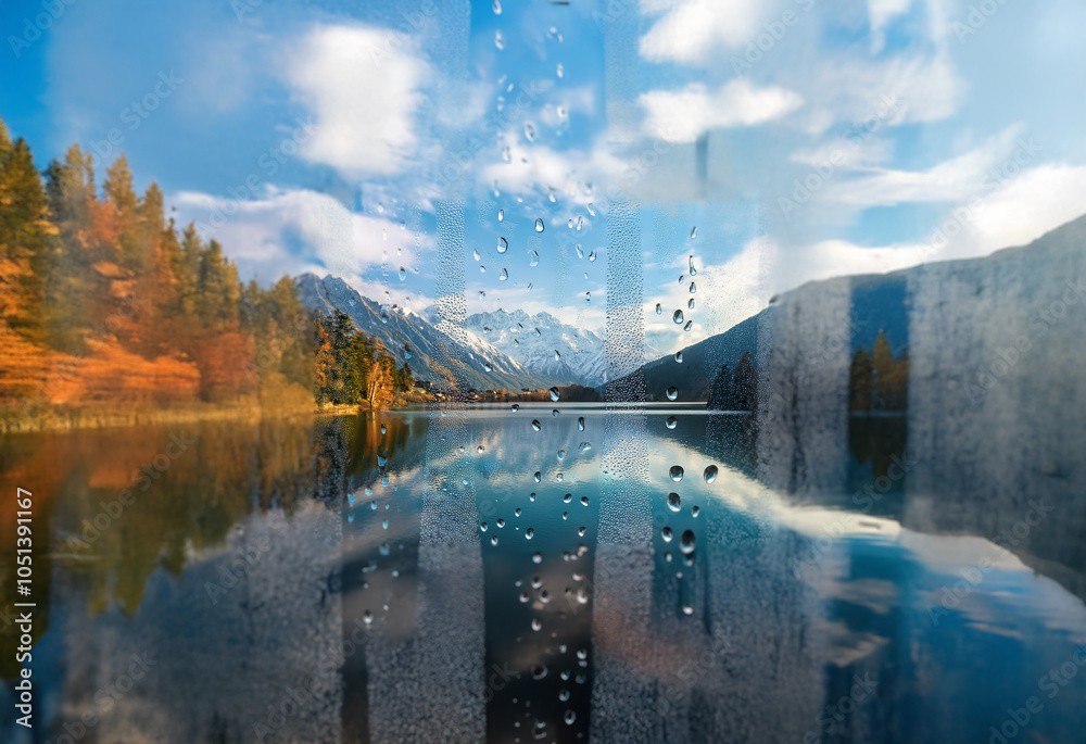 Poster a picturesque view of a mountain lake through a rain-streaked window with a reflection of the surrou