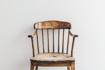 Fototapeta premium Vintage wooden chair on white wall background