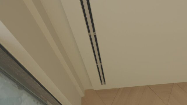 An air conditioning vents in a ceiling
