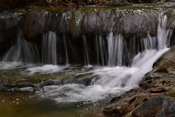 Obraz premium Visit the waterfall for additional refreshment