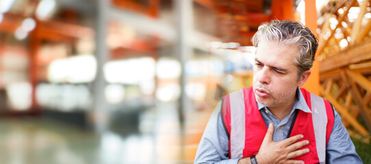 Thirsty and tired worker setting on the floor.