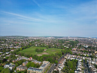 High Angle View of Most Beautiful and Attractive British Tourist Attraction of Brighton seaside resort and Beach City of East Sussex, England GB. Footage Captured with Drone's Camera on May 9th, 2024
