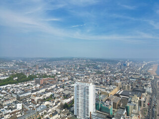 Obraz premium High Angle View of Most Beautiful and Attractive British Tourist Attraction of Brighton seaside resort and Beach City of East Sussex, England GB. Footage Captured with Drone's Camera on May 9th, 2024