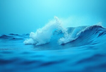 A dynamic wave captured in detail, showcasing water texture against a blue gradient background, concept of nature's motion