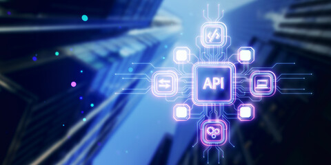 Glowing API hologram on blurry city background. Internet, business, Technology and network concept. Application Programming Interface. Software development tool. Double exposure.