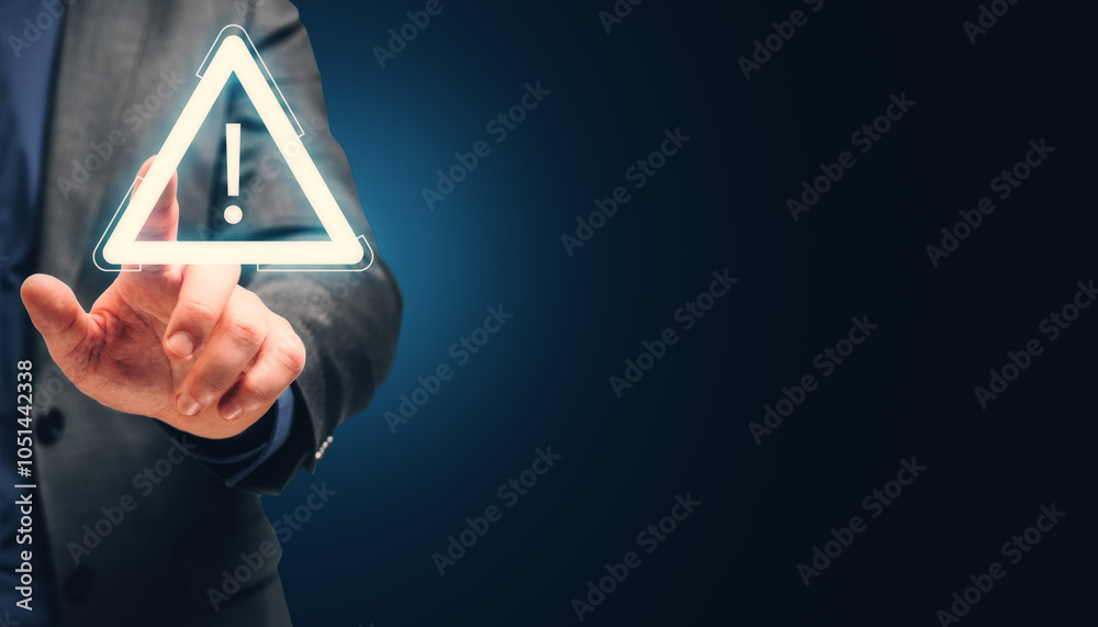 Poster close up of businessman hand pointing at glowing attention sign on dark background with mock up plac