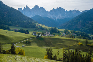 Naklejka premium Breathtaking autumn vistas of the Dolomites revealing enchanting villages and mountainous beauty