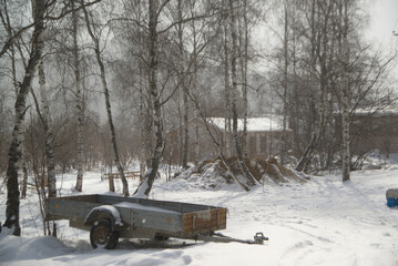Old trailer in the countryside. Equipment for working in the field. Located at Listvyanka, Irkutsk Oblast, Russia.