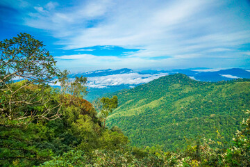 Fototapeta premium A mesmerizing view of rolling hills under a vast blue sky.