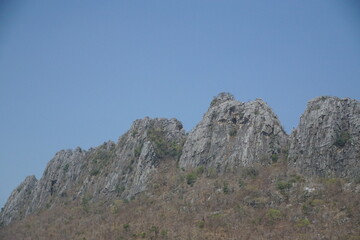Fototapeta premium The mountains are covered in rocks and trees