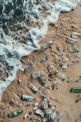 A close-up of ocean waves washing over scattered plastic bottles and debris on a sandy beach. 